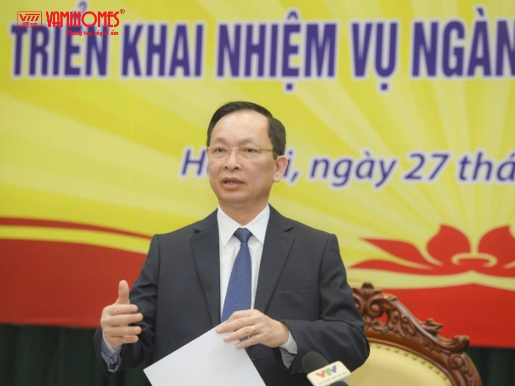 Hình ảnh ông Đào Minh Tú - Phó thống đốc NHNN tại họp báo ngày 27/12